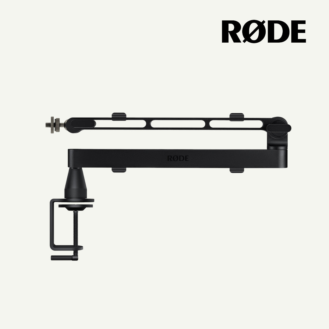 RØDE clamp-on arm mount in matte black, shown against a light off-white background with the RØDE logo in the top right corner.