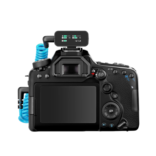 Camera with a microphone attached on a white background