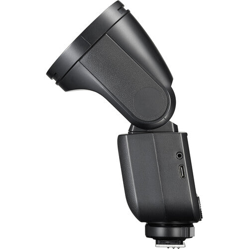 Side view of Godox V1 mid camera flash with digital display on a white background unit on a white background