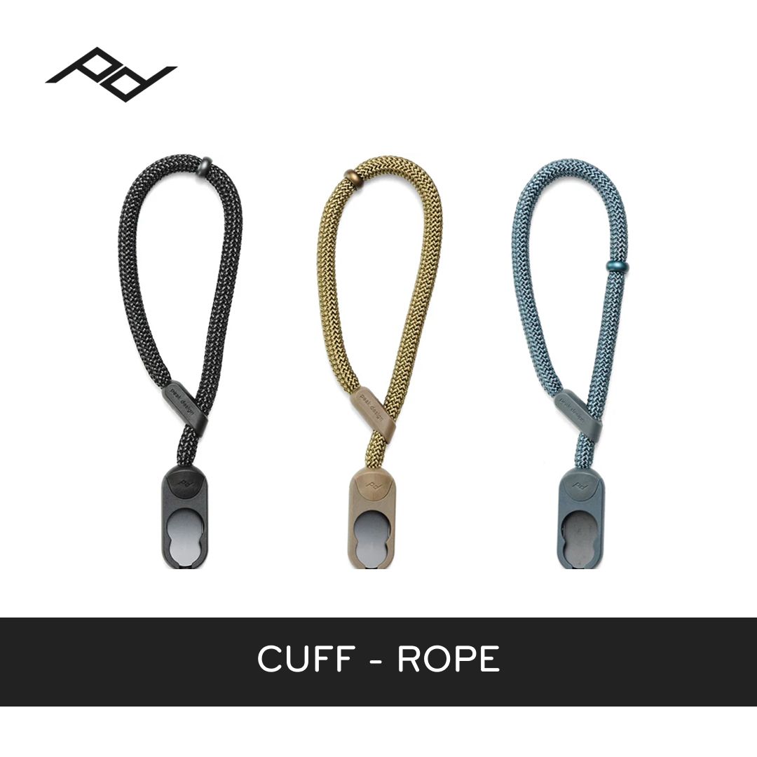 Three cuff ropes in black, gold, and blue on a white background with 'peak design' logo.