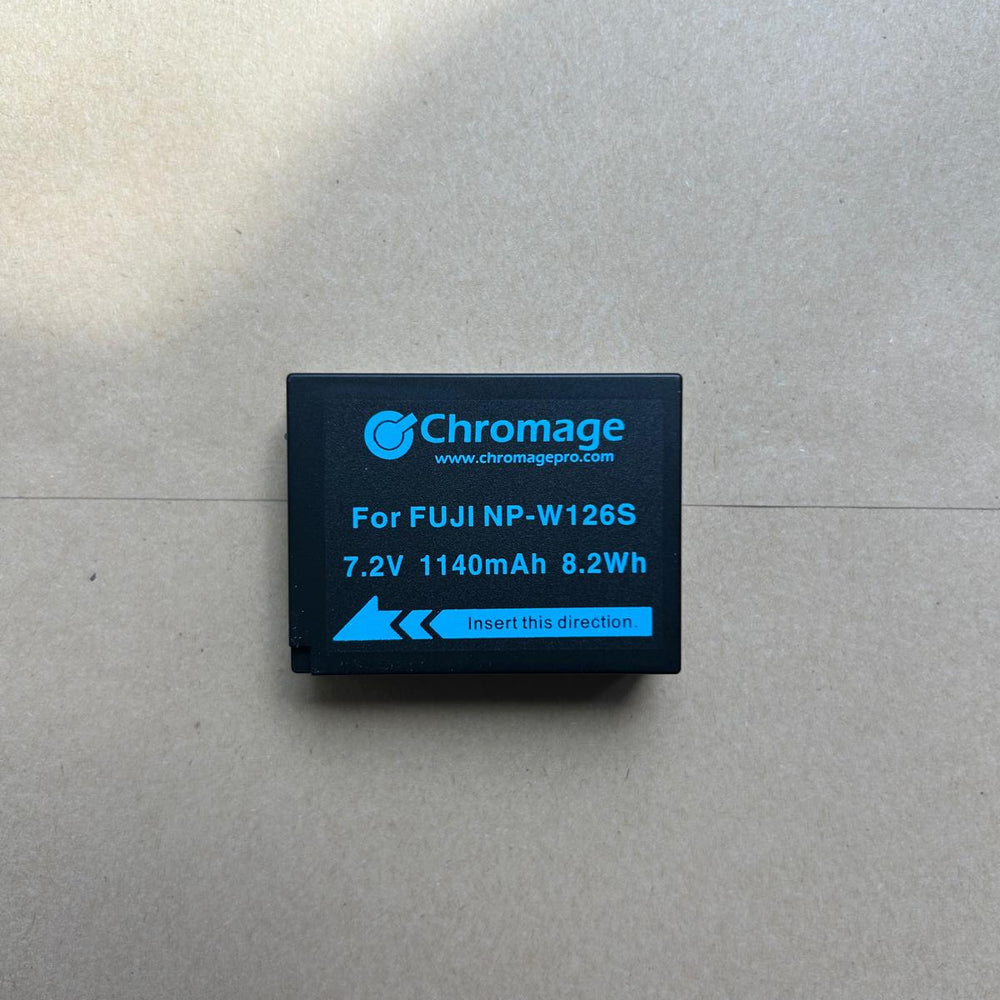 Chromage NP-W126S battery with blue text on a gray surface