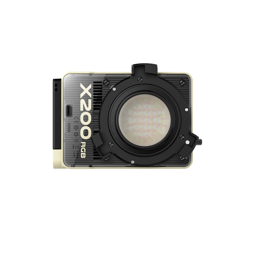 A X200 RGB camera light panel with a black front light housing and a gold-colored side casing, shown against a plain white background.