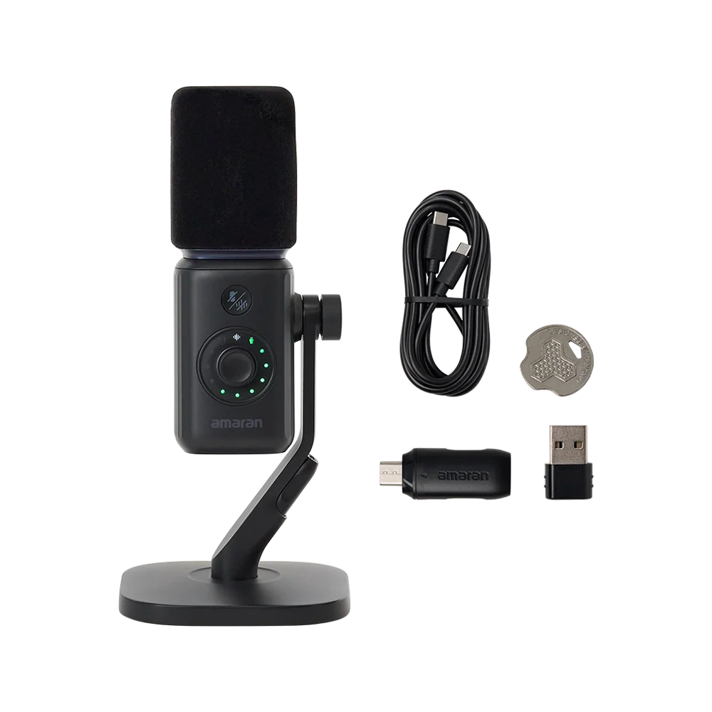 Black amaran Mic Desktop Stand Kit displayed with included accessories, including a USB-C cable, wireless receiver, USB adapter, and adjustment tool against a transparent background.