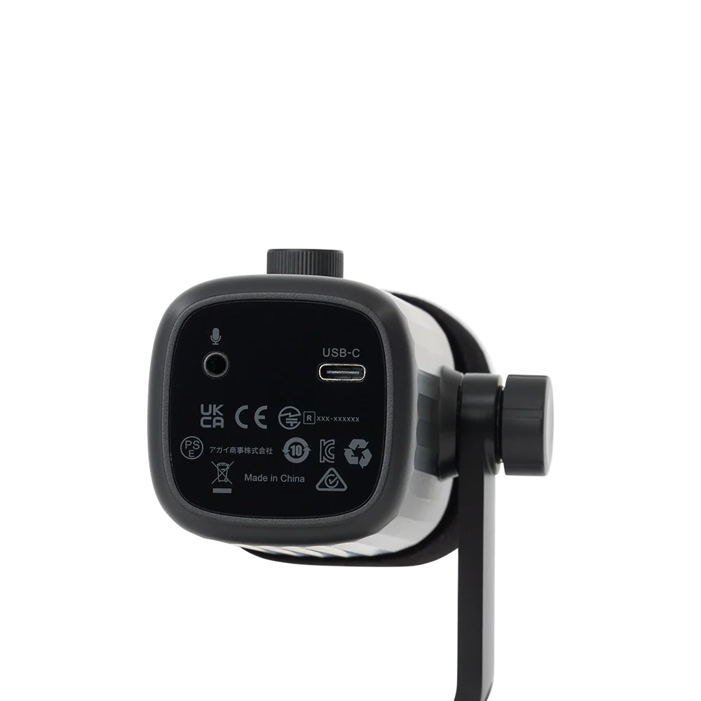Bottom panel view of the amaran Mic Desktop Stand Kit showing the 3.5mm headphone jack, USB-C port, and regulatory compliance markings against a transparent background.