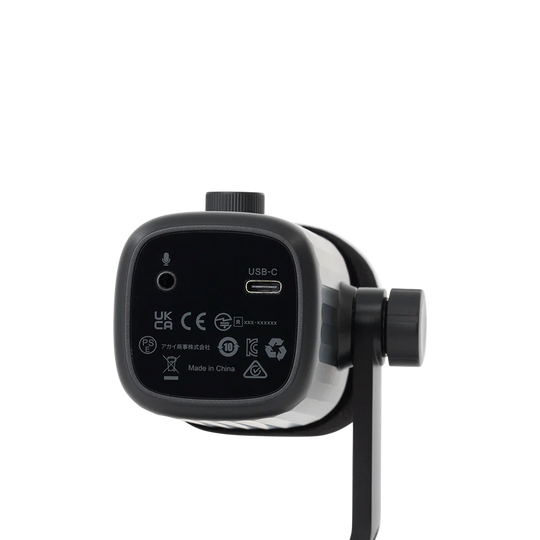 Bottom panel view of the amaran Mic Desktop Stand Kit showing the 3.5mm headphone jack, USB-C port, and regulatory compliance markings against a transparent background.
