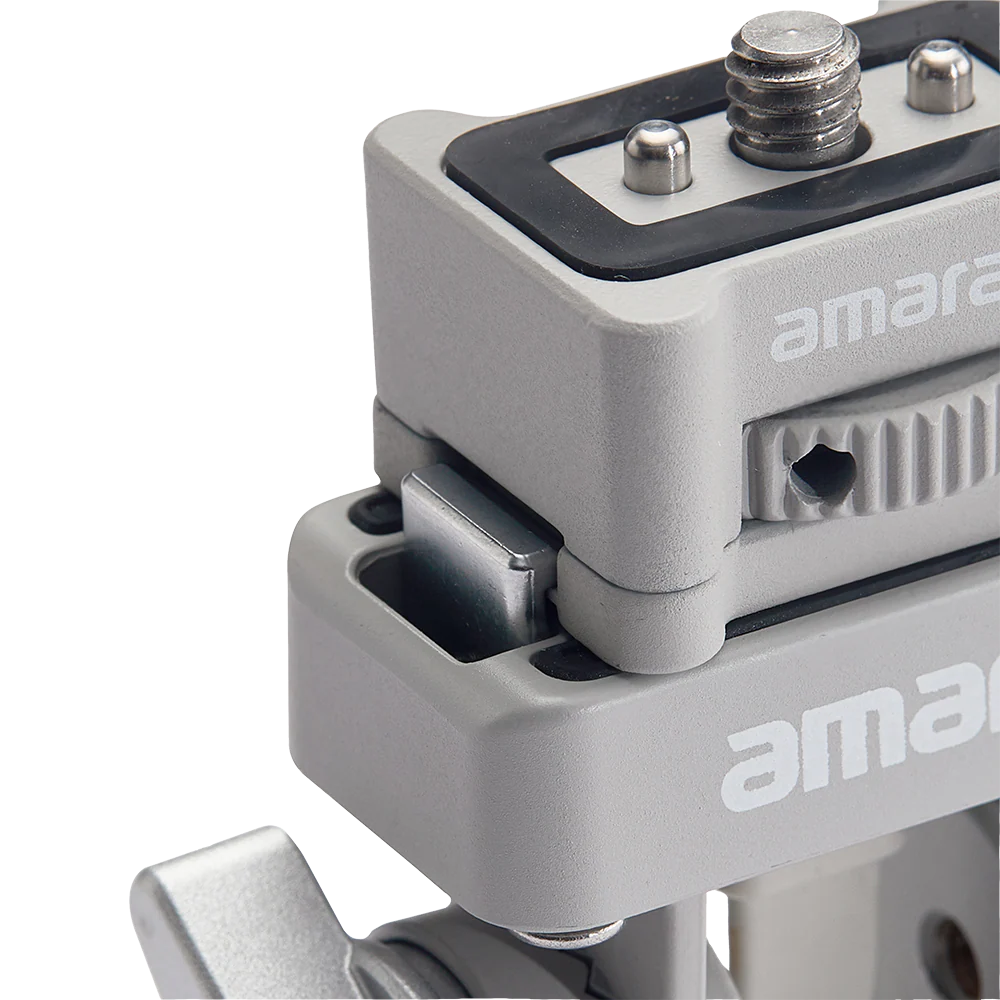 Amaran Ace E-Lock Adapter shown on a light gray background with the brand logo at the top left and a black label at the bottom reading 'amaran Ace E-Lock Adapter'. The product is a compact gray metal adapter with a black top plate and silver screw terminals.