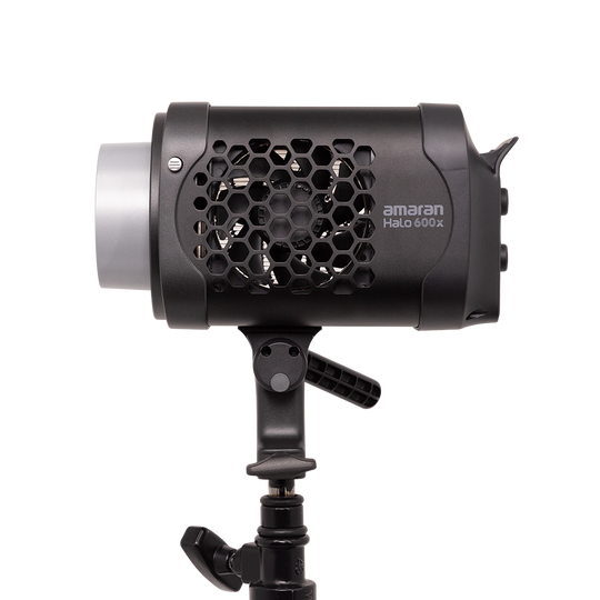 amaran Halo 600x Studio light with honeycomb grid on a stand, featuring 'Amaran' branding.