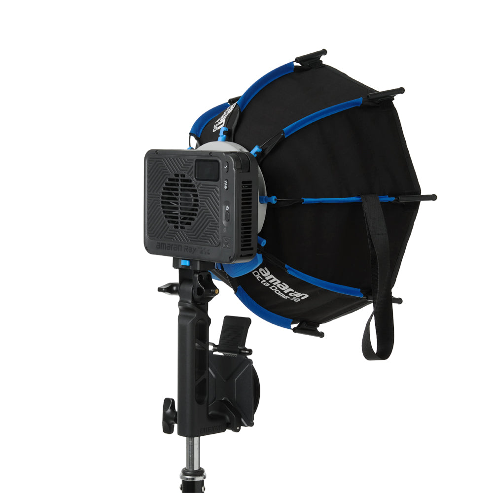 Studio light with amaran octa dome and power supply on a white background