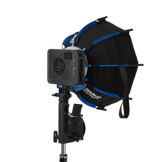 Studio light with amaran octa dome and power supply on a white background