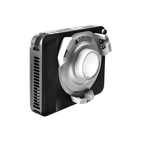 Black and silver light modifier on a white background