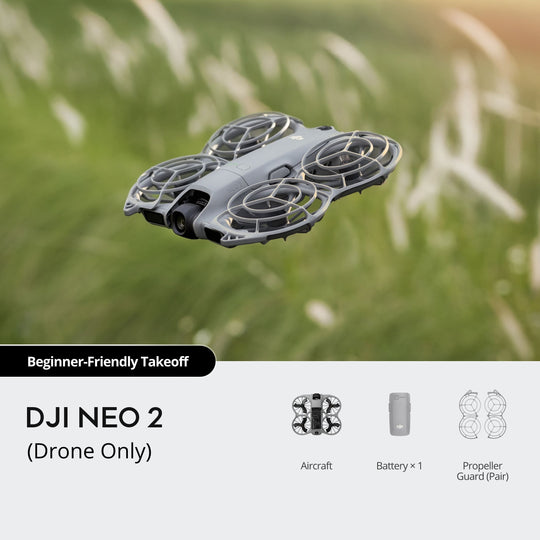 DJI NEO 2 drone in flight with grass background