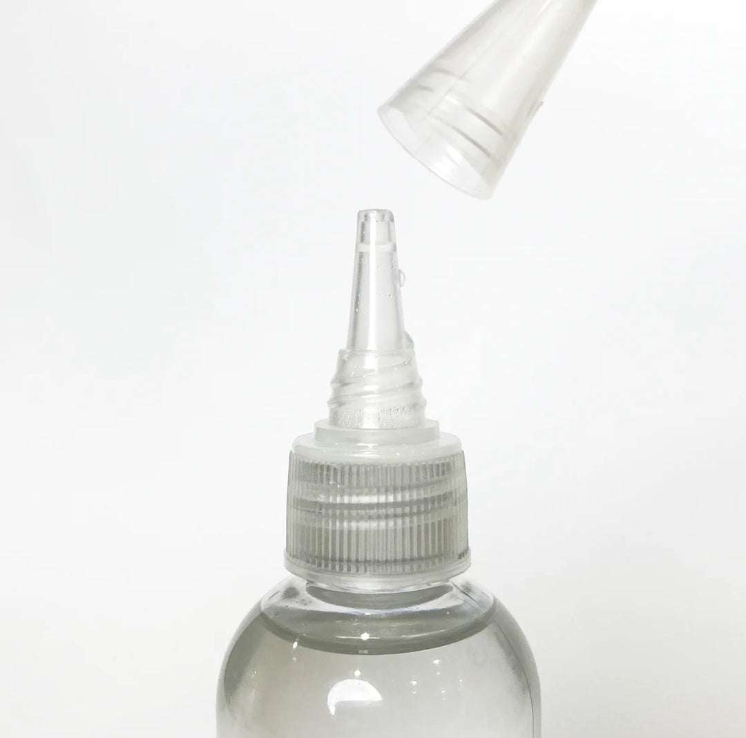 close up shot of PMI Cloud Formula Refill 100ml bottle against a white background