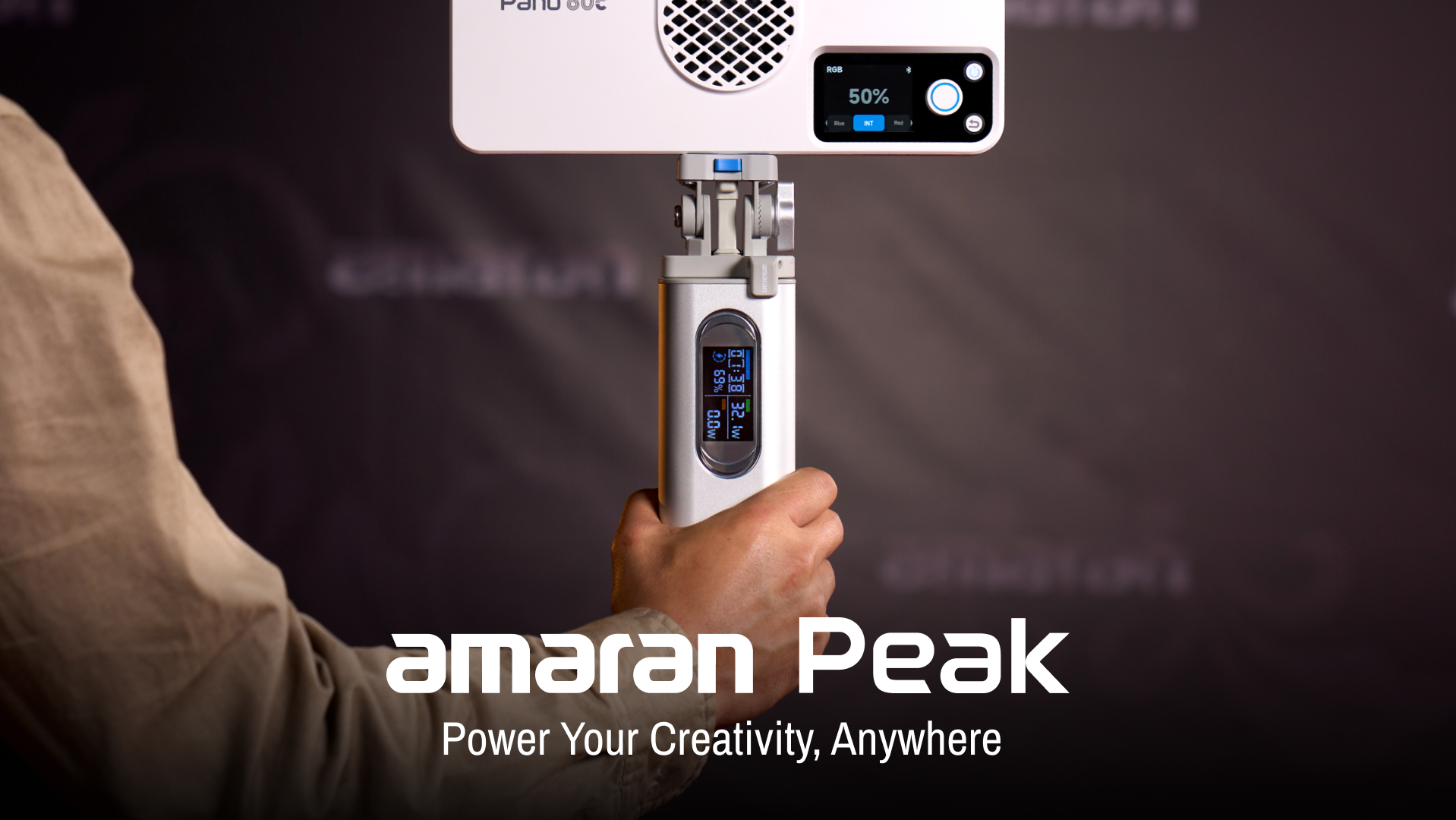 amaran Peak poster, a person's hand holding amaran peak with the text 'amaran Peak' and tagline 'Power Your Creativity, Anywhere'