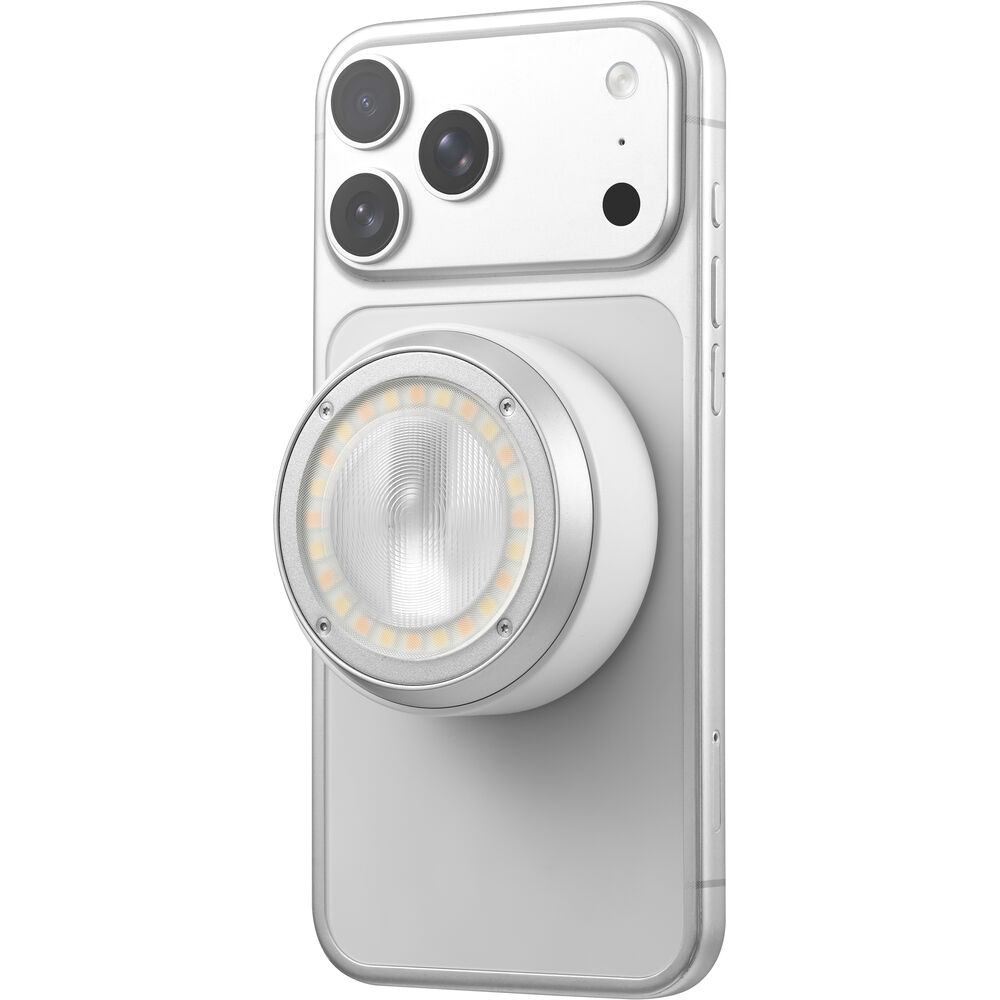Godox A2 smartphone xenon flash magnetically attached to the back of a smartphone.