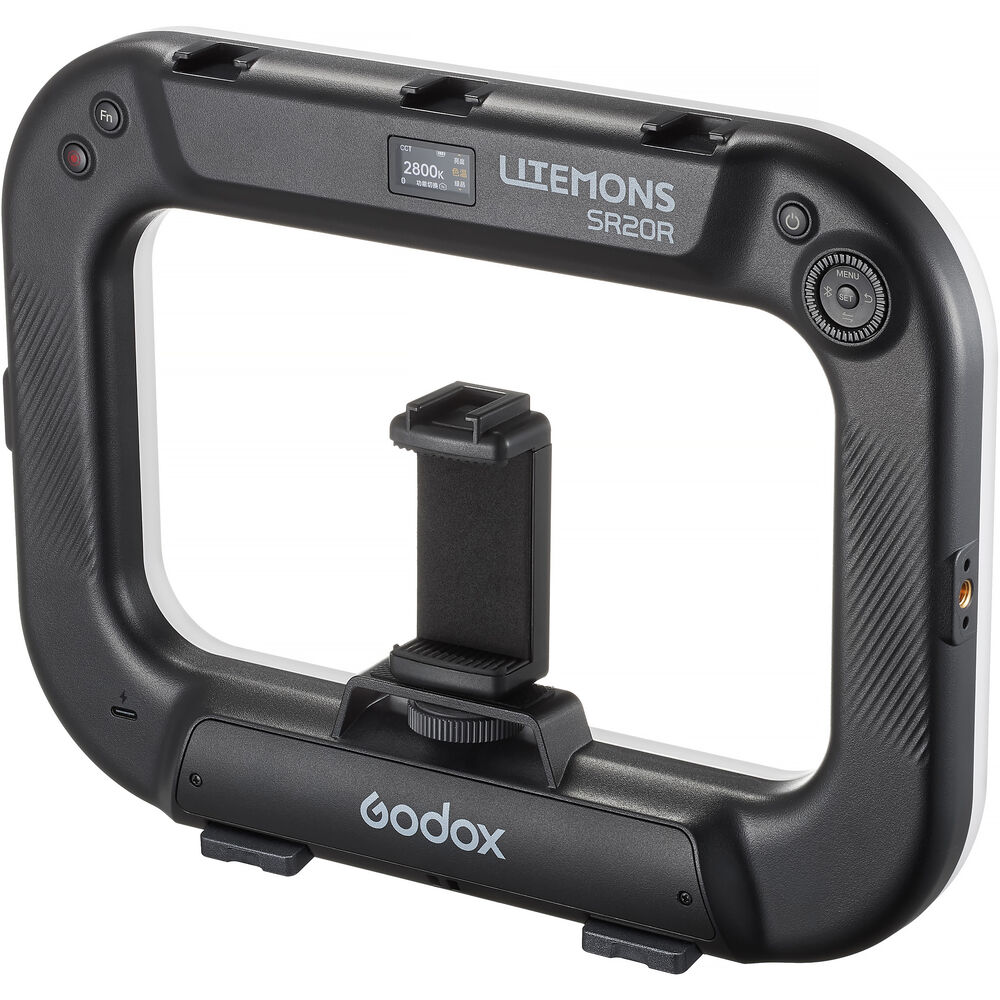 Close-up view of Godox Litemons SR20R portable RGB LED light showing OLED display panel, control dial, and function buttons.
