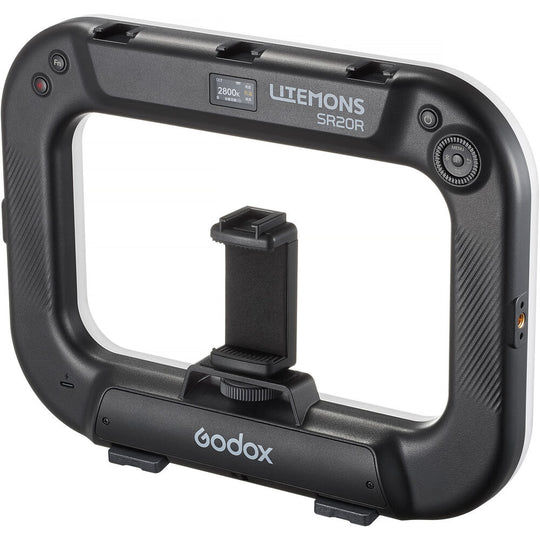Close-up view of Godox Litemons SR20R portable RGB LED light showing OLED display panel, control dial, and function buttons.