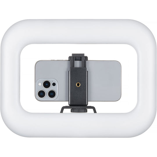 Rear view of Godox Litemons SR20R portable RGB LED light with smartphone secured in the central spring clamp.