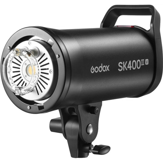 Angled front-side view of Godox SK400III-V studio flash strobe highlighting the LED modeling light and flash tube.