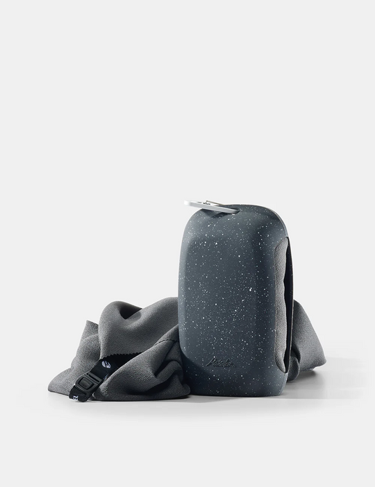 Two gray bags, one with a textured pattern and the other plain, on a white background.