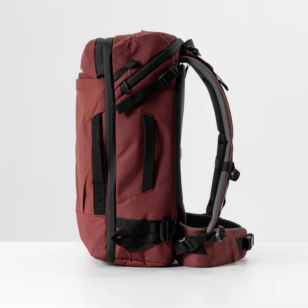 side view of garnet globerider35 on light gray background