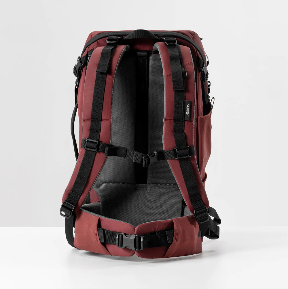back view of garnet globerider35 on light gray background