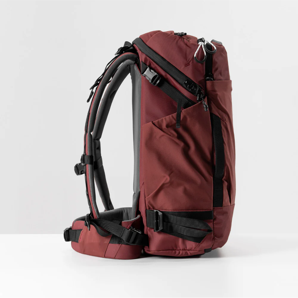 side view of garnet globerider35 on light gray background