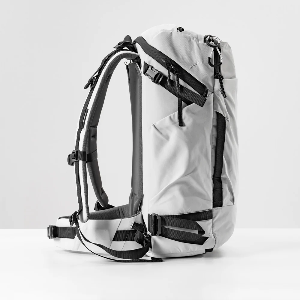 Left side view of arctic white globerider35 on white studio background