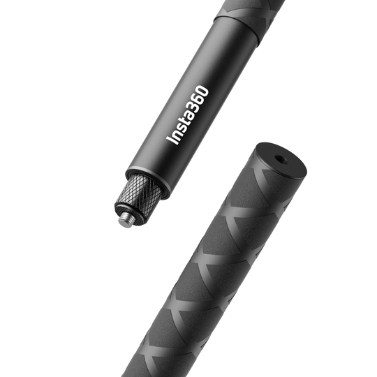 Close-up view of the Insta360 114cm Invisible Selfie Stick showing the top 1/4-inch mounting screw with knurled collar and the bottom textured non-slip rubber grip with 1/4-inch tripod thread.