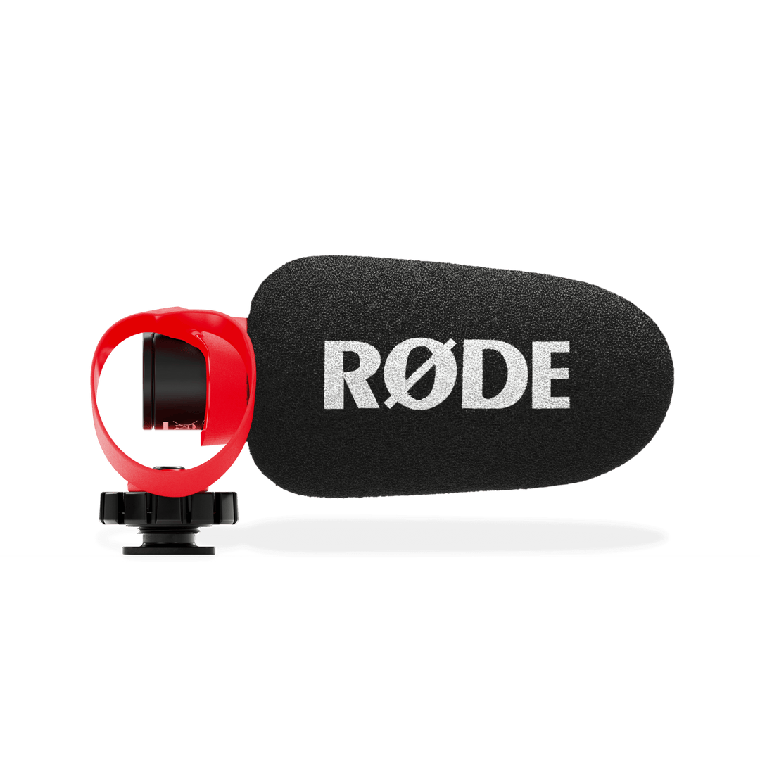 Rode microphone with foam cover on a black background