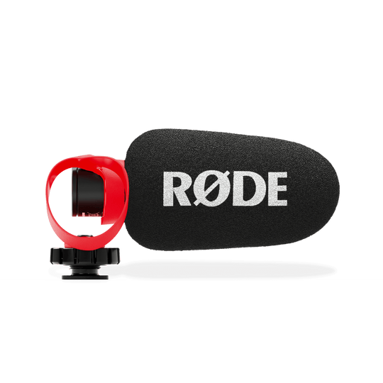 Rode microphone with foam cover on a black background
