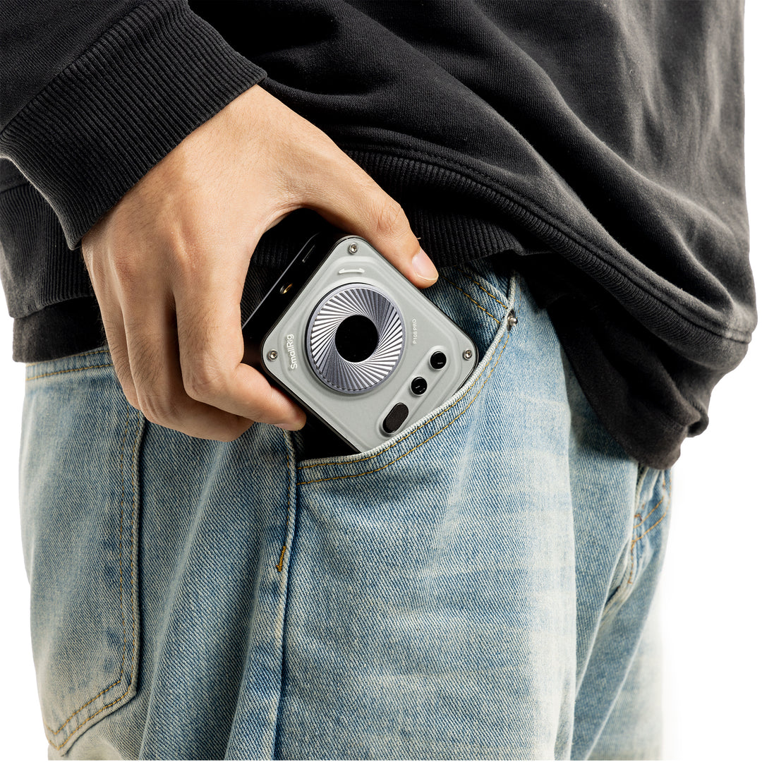SmallRig P108 Pro pocket-sized LED video light being placed into a jeans pocket.