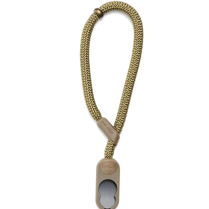 Gold chain lanyard with a clip on a white background