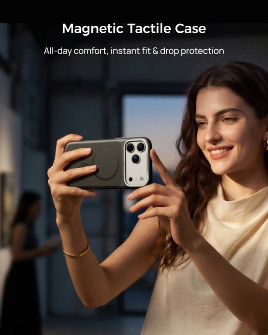 Woman holding iPhone protected by Telesin magnetic tactile case with drop protection feature.