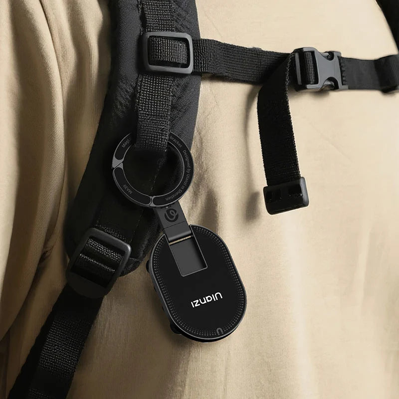 Ulanzi MA39 MagLock suction mount hanging via its carabiner clip from a backpack strap.