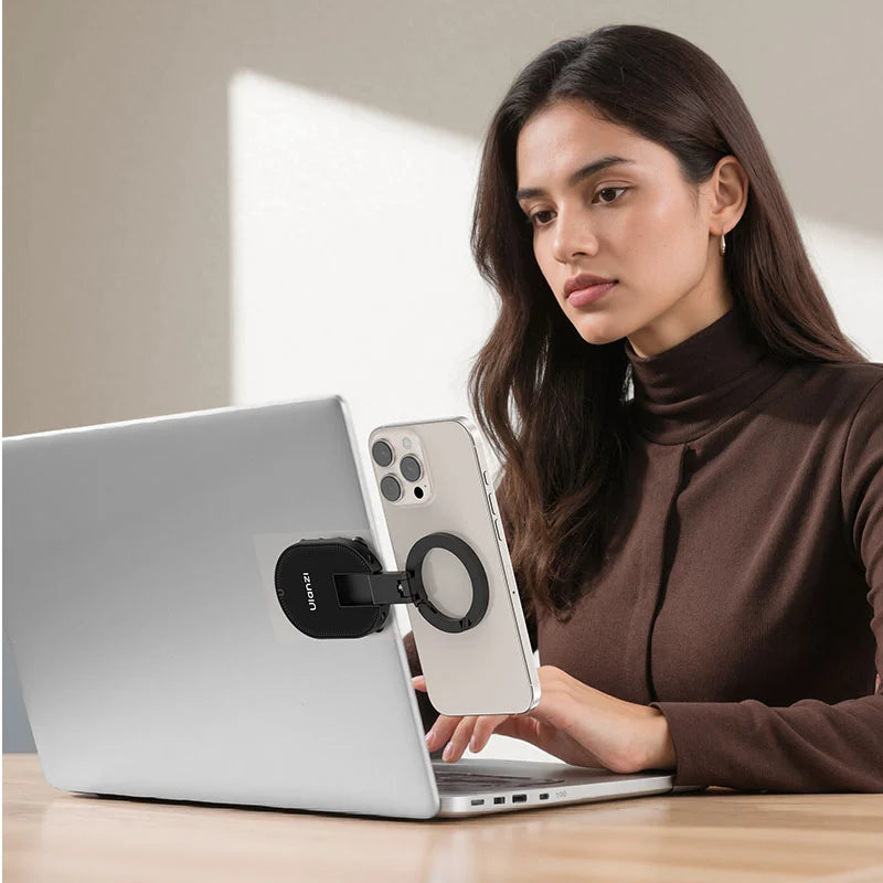Ulanzi MA39 MagLock suction mount attached to a laptop lid holding an iPhone as a secondary display screen.