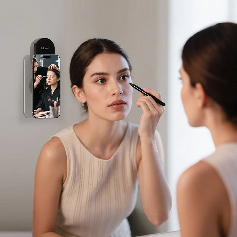 Ulanzi MA39 MagLock suction mount attached to a bathroom mirror holding an iPhone for a makeup tutorial application.