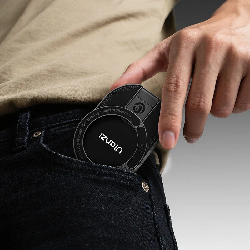Ulanzi MA39 MagLock suction mount clipped securely onto a pants pocket for easy everyday carry.