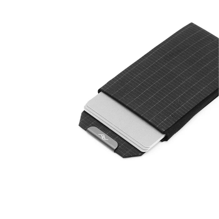 Black Peak Design Everyday Slim wallet with a grid pattern on a white background