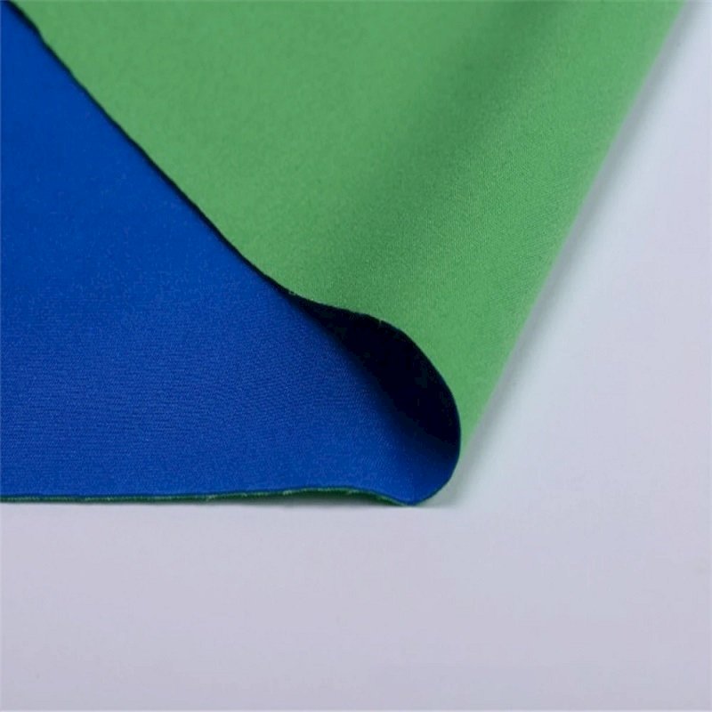 Dual sided wrinkle-resistant fabric cloth in green and blue, typically used for chroma key compositing in photography and video production.